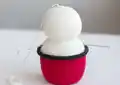 Snowman Mug Amigurumi Pattern step 4 - final assembly and finishing