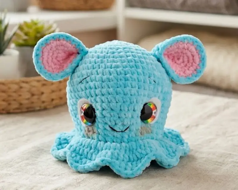 Complimentary Intermediate crochet pattern: Blue the Dumbo Octopus Amigurumi Pattern - Simple to follow guide