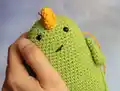 Mr. Pistachio the Dinosaur Amigurumi Pattern step 3 - details and accessories