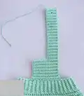 Baby Romper Crochet Pattern step 4 - final assembly and finishing