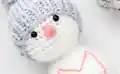 Pom Pom Snowman Hat Crochet Pattern step 2 - assembly progress