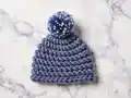 Spiral Raccoon Hat Crochet Pattern step 2 - assembly progress