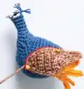 Peacock Amigurumi Pattern step 4 - final assembly and finishing