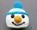 Snowman Amigurumi Pattern step 4 - final assembly and finishing