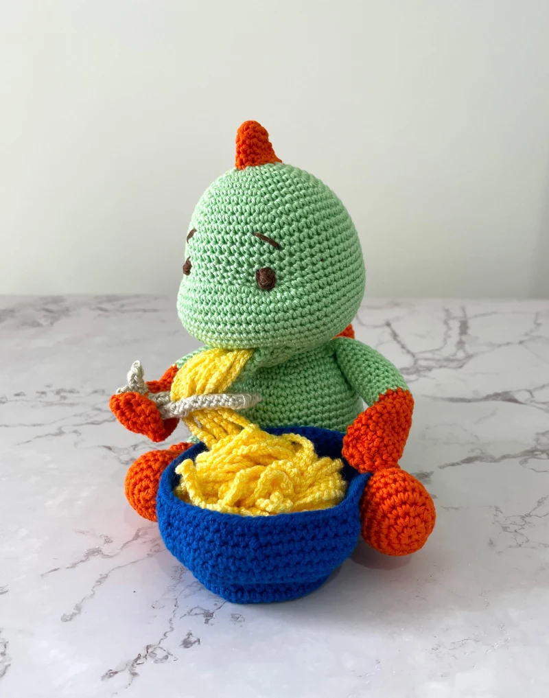 Complimentary Intermediate crochet pattern: Spaghetti-Eating Dinosaur Amigurumi Pattern - Simple to follow guide